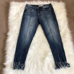 Jeans with trimmed bottoms